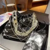 designerka torebki luksurys torebki damskie torby zakupowe projektant sznurka crossbody torebka złota moneta wisiorek złota nić