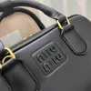 koeienhuid leer Miui Arcadie Lolita bowlingtas voor dames heren crossbody met schouderbanden tassen bakken handtas mode dame luxe designer clutch met handvat aan de bovenkant