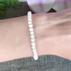 MG1049 Bracelet en pierre de lave blanche Bracelet diffuseur d'huile essentielle bijoux d'aromathérapie perle de lave délicate Yoga Bracelet extensible 353j