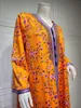 Etniska kläder 2023 muslimsk klänning vår sommar modestil kvinnor långärmad v-ringning polyester tryck orange abaya