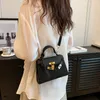 2024 Nouvelles femmes sentiment mignon unique avec texture Internet célébrité portable sac à main vente 60% de réduction sur la boutique en ligne