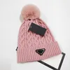 Designer kvinnor vinter stickad mössa ull hatt kvinnor chunky stickad tjock varm faux päls pom beanies hattar kvinnliga motorhuven beanie skalle mössor 10 färger