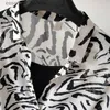 Damesblouses Shirts Lady 2023 Tweedelige set Zebra's Chiffon Shirt Halve mouw Grote maten Zomer V-hals Dames Casual blouse Sexy Raster Gestreept Roze Tops L230919