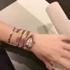 Mulheres bvlgairs de luxo relógios de luxo lady lady mulheres assistem uma pulseira de ouro rosa em forma de cobrança com diamante banda de aço embrulhada feminina j7on gvrq