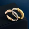 Paarslotring met U-vormige ovale roségouden halve diamant Tweekleurige designerring voor dames