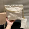 Klasyczna designerska torba crossbody 2023 NOWOŚĆ PARES Fashion Womens oryginalna skórzana marka mini śmieciowa torba wysokiej jakości metalowej torby na ramię