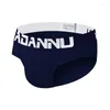 Undannu Sports Fashion Cotton 남자의 단색 팬티 엉덩이를 들어 올리는 통기성 탄력있는 편안한 섹시한 브리핑 남자