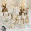 Decorações de Natal Moderna Brilhante Cerâmica Árvore de Natal Luz Decoração para Casa Porcelana Branca Casa de Natal Santa Deer Elk Figurine Ano 230920