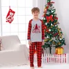 Dopasowanie rodziny stroje Xmas Family Look świąteczne piżamę Zestaw piżamy Santa Tree Drukuj córka tata syn pasujący do ubrania dziecko romper miękki piżama 230920