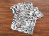 Herr t shirts 23ss fasion wacko maria hawaii strandstil tunna fick män kvinnor tiger full tryck lapel skjorta topp med taggkläder