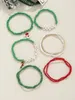 Strand 9st Ladies Glass Rice Bead String god jullegering Santa kryckor hängande armband