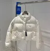 2023 Parka da donna Piumino di design piumino Cappotto invernale da donna Trench da donna Manica lunga lettera impermeabile con cerniera Cappotto Moda anni '20