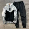 Automne / hiver pour hommes de survêtement lettre imprimée lettre à capuche à capuche Sweatshirts pantalons décontractés pour hommes décontractés