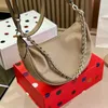 مصمم فاخر كلاسيكي حلقة Crossbody Bag French Baia Hollow Flower Bag Bag Paris الشهيرة الإبطية أعلى جودة حقيبة جلدية حقيقية حقيبة من الأزياء