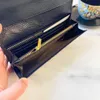 Kvinnor Cowhide Fold Twice Wallet Designer Bag Luxury Change Card Bag Key Bag