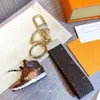 Porte-clés de luxe design unisexe porte-clés en cuir véritable avec porte-clés en acier inoxydable porte-clés pour hommes good269l