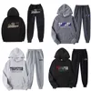 Trapstar hommes sweat à capuche motif de lettre pour femme imprimé en peluche chaud à capuche col rond sweat-shirt essentiel vêtements de sport amples pour couple ensemble de sweat à capuche de créateur