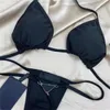 Costume da bagno di lusso con scollo all'americana Bikini da donna Abbigliamento sexy Monokini cavo femminile Costume da bagno di design nero imbottito Body solido da nuoto