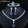 Bruiloft Sieradensets CWWZircons 4 Stuks Blauwe Kubieke Zirkoon Kristal Bloem Drop Ketting Oorbel Armband Ring Bruidskostuum T439 230920