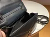 Ny lyxdesigner handväska mini crossbody väska designer väskor kvinnor axel väska avslappnad koppling mode plånbok middag väskor spänne stängning