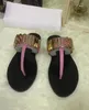 Modeontwerper Sandalen Slippers Damesslippers Platte hak Goudkleurige metalen letter Kalfsleer rundleer Echt leer Luxe Ronde neusgesp Damesslippers