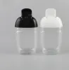 bottiglia di disinfettante per le mani nero di qualità all'ingrosso da 30 ml bottiglia di plastica PET semicircolare con tappo a scatto bottiglia per bambini disinfettante disinfettante per le mani ZZ