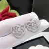 Acessórios de designer brincos de flor de luxo meninas inlay brincos de diamante banhado a prata brincos de jóias casamento chd23092018 elsaky