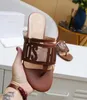 Lyx modedesigner sandaler kvinnor sommar mode äkta läder casual skor toppkvalitet märken glider strand flip-flops platt dam tofflor semester moccasin