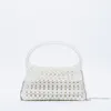 Kvällspåsar 2023 Handvävd White Pearl Ladies Handbag Vintage Simple Handmade pärlstav en axelkorsning för kvinnanpassning