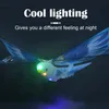 Elektriska RC Animals Outdoor Space Bird Flying Toys Helicopter LED Lysande elektrisk kast Cirklande barn USB -examen hand 360 mini 230920