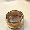 Klassisk diamantpläd Lyxdesigner ring Mens kvinnor Diamantring Guld Vitt guld Rose Gold Non Fading High Grade Sterling Silver Titanium Steel Par Ring