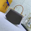 Kadın tasarımcı çanta lüks taraklı crossbody çanta yüksek kaliteli orijinal deri kahverengi çiçek mektup bayanlar küçük omuz çanta bayanlar moda