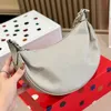 Luxury Designer Classic Loop Crossbody Bag French Baia Hollow Flower Shoulder Bag Paris Famous Underarm Bag Top Quality äkta lädermåne -väska Fashion Purse