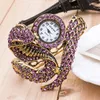 Relojes de pulsera Reloj de pulsera Forma de serpiente de moda de lujo para mujeres Damas Retro Escala romana Relojes de cuarzo de cristal Reloj de regalo