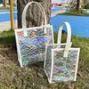 Sacos de compras Laser Clear Tote Bag Bolsa Estádio Resistente à Água PVC Plástico Presente para meninas e mulheres transparentes