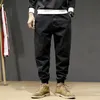 Jeans da uomo Stile giapponese Moda Uomo Loose Fit Spliced Designer Pantaloni cargo Hombre Harem Streetwear Hip Hop Joggers317x