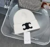 럭셔리 클래식 니트 모자 비니 캡 디자이너 여성 토끼 머리 모자 모자 공식 웹 사이트는 남성과 여성을 위해 동기화되어 따뜻함 G239204BF