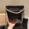 Klasyczna designerska torba crossbody 2023 NOWOŚĆ PARES Fashion Womens oryginalna skórzana marka mini śmieciowa torba wysokiej jakości metalowej torby na ramię