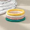 Pulsera con cuentas de hilo, arcilla polimérica, monocromática, simplicidad de moda, bohemia, fuerza elástica, tejido a mano, juego de cuentas de arroz Tira