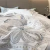 Set di biancheria da letto 100 cotone egiziano Set da sposa di lusso Copripiumino piatto lenzuolo con angoli Federe Ricamo a farfalla 230921