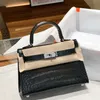 En Kaily Luxury Bag äkta läder Kvinnor 2023 NYT Texture Second Generation Mini Palm Mönster One Shoulder Handheld Crossbody for Women