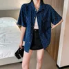 Kvinnor BLOUSES Blue Denim Lapel Shirt för 2023 Summer Design Sense Niche Short Sleeved Jacket Top