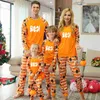 Roupas combinando para a família 2023 Novas roupas de festa de Halloween Adultos Crianças Conjunto de pijama combinando Romper de bebê Estampa luminosa Solta Homewear Roupa familiar T230921