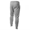 Męskie spodnie męskie solidne kolory fitness elastyczne talia sportowe rajstopy szczupłe spodnie siłownia jogging na zewnątrz modne dno