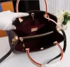 Diseñadores de lujo Bolsos Monederos Montigne Bolsa Mujer Tote Marca Carta Relieve Cuero genuino Bolsas de hombro Crossbody 41056 Luxurybag116