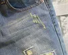 Jeans voor heren Koreaanse mode-gaten 9-punts jeansbroek voor heren Small Foot Slim Fit man cargobroek Street chic denim broek L230921