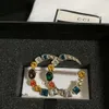 Stift, broscher nya g-bokstäver vintage guldgåva brosch designer smycken kvinnor bröllop fest eleganta stift mode multicolor pärla
