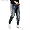 Mäns jeans herrar jeans harem byxor modefickor desering löst fit baggy moto jeans män sträcka retro streetwear avslappnade avsmalnande jeans l230921