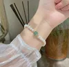 Strang 2023 Chinesische Barockperle vergoldete Legierung Vintage Armbänder für Frauen Modeschmuck