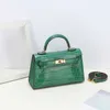 En Kaily Luxury Bag Lacquer Läder andra generationens väska alligator Mini One Shoulder Messenger Fashion Texture Söt handväska EC39